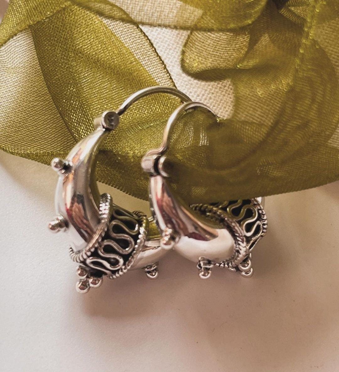 Exquisite large dolki tribal silver hoops with antique detailing.