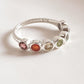 Sterling silver eternity band ring with seven chakra gemstones