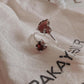 Unique adjustable silver ring with two raw uncut garnet gemstones