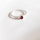 Elegant garnet solitaire ring in sterling silver