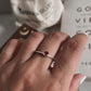 Garnet solitaire gemstone set in a polished silver ring