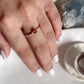 Simple and elegant silver ring with a garnet solitaire stone