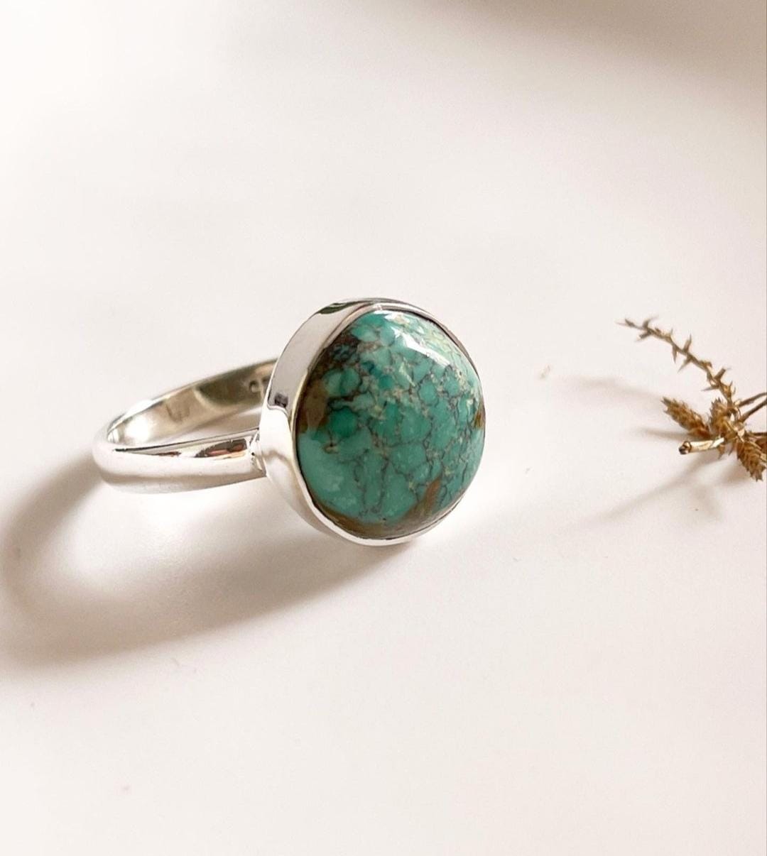 Bold big Tibet turquoise silver ring with intricate detailing.