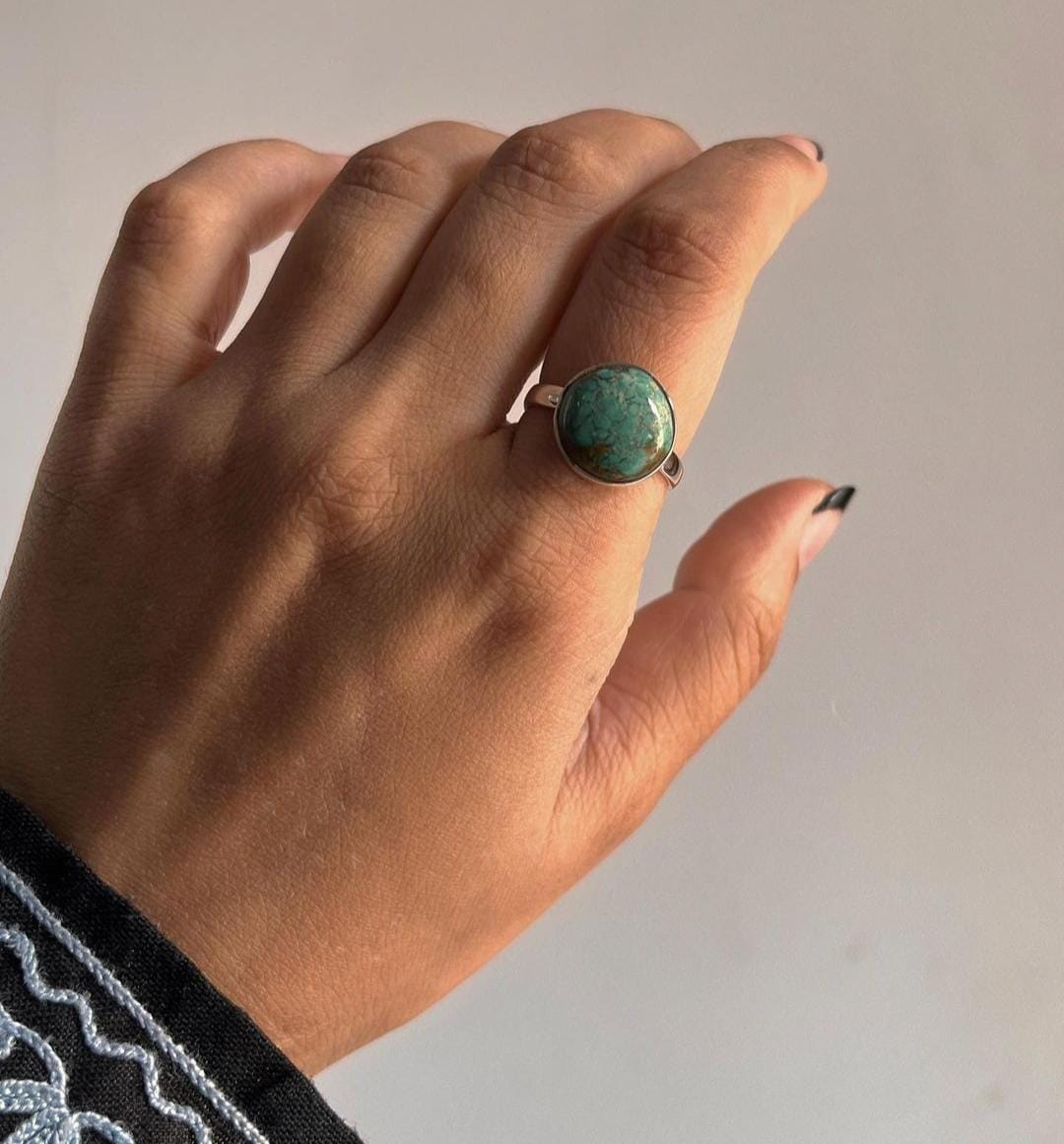 Exquisite big turquoise silver ring featuring a Tibet-inspired design.