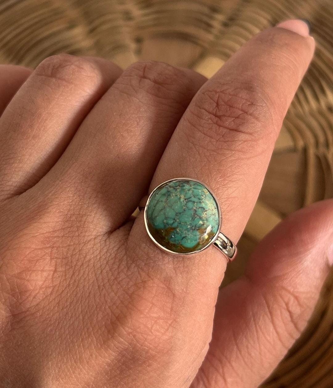 Handcrafted big Tibet turquoise silver ring with a striking design.