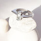 Chic Blue Topaz Silver Ring with Side Stone Details