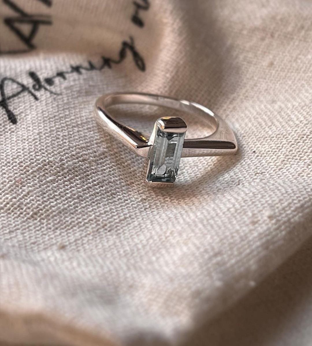 Blue Topaz Side Stone Silver Ring