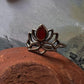 Carnelian Divine Lotus ring with detailed floral pattern