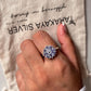 Elegant tanzanite flower statement ring in sterling silver
