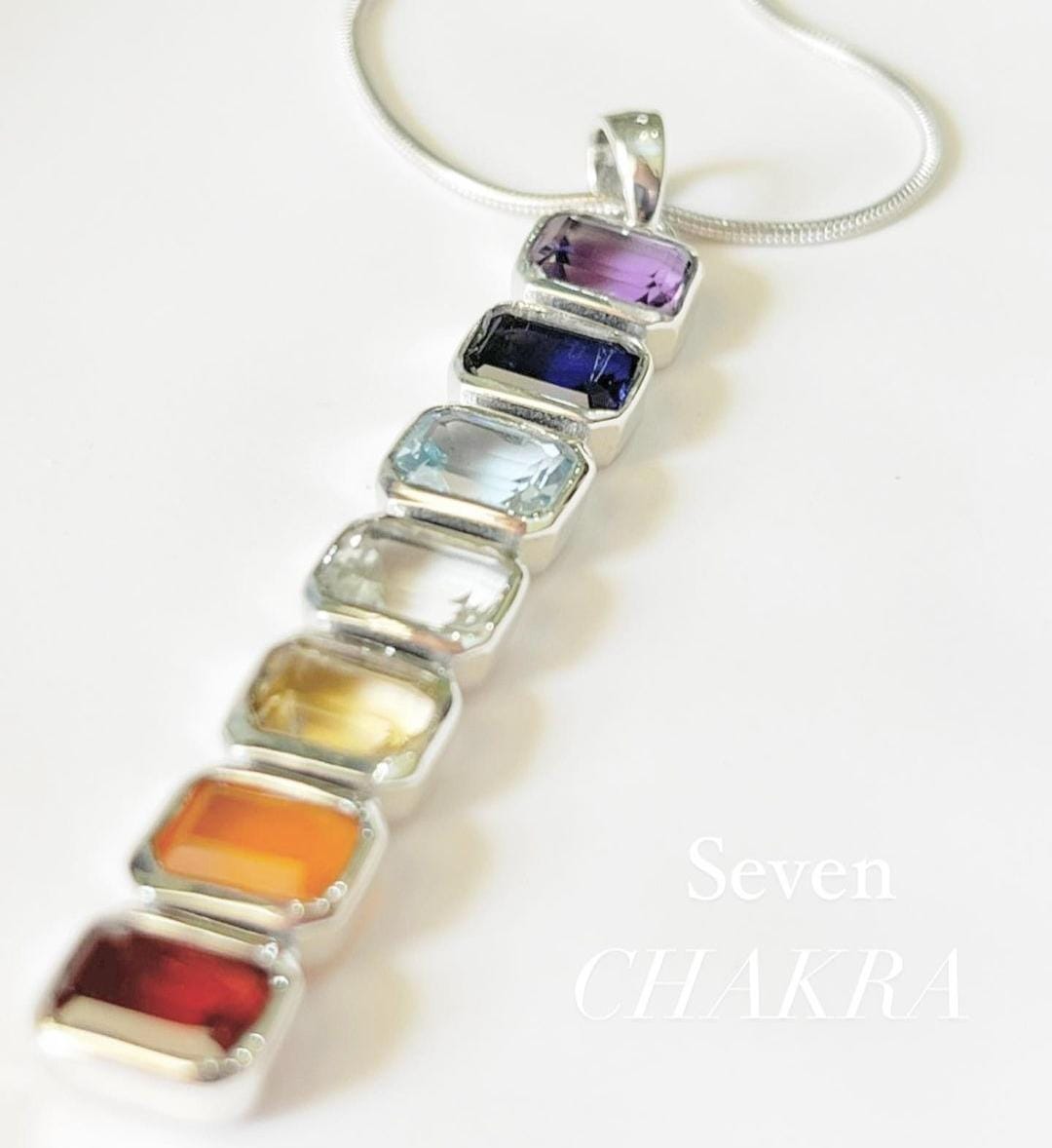 Bold seven chakra rectangular cut pendant in sterling silver