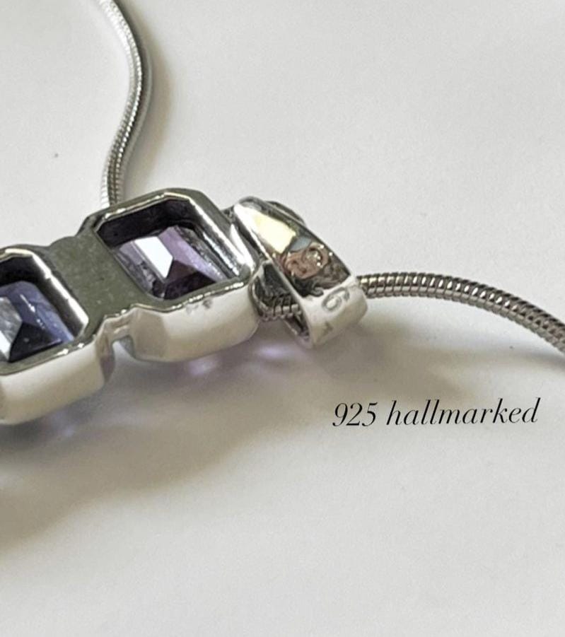 Timeless seven chakra rectangular cut pendant for energy healing