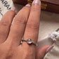 Sophisticated rope band silver ring with rose quartz stone