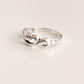 Chic wave motif silver ring for a modern look