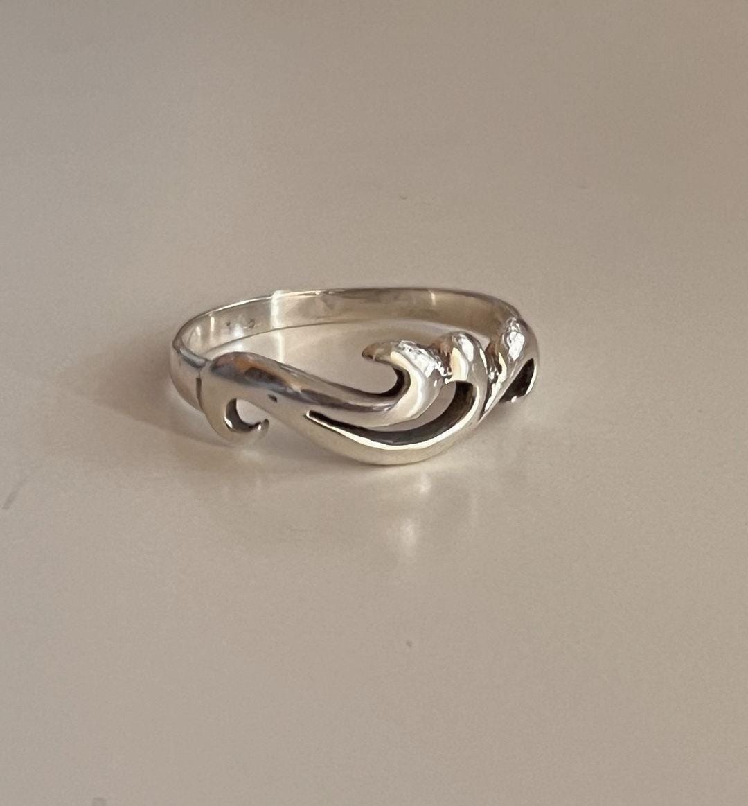 Stylish wave motif ring in sterling silver