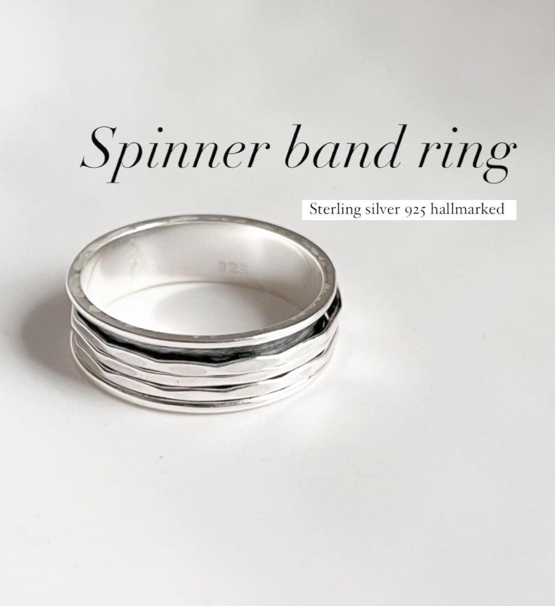 Hammered spinner ring in sterling silver