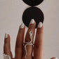 Timeless silver ring with two intertwined serpents