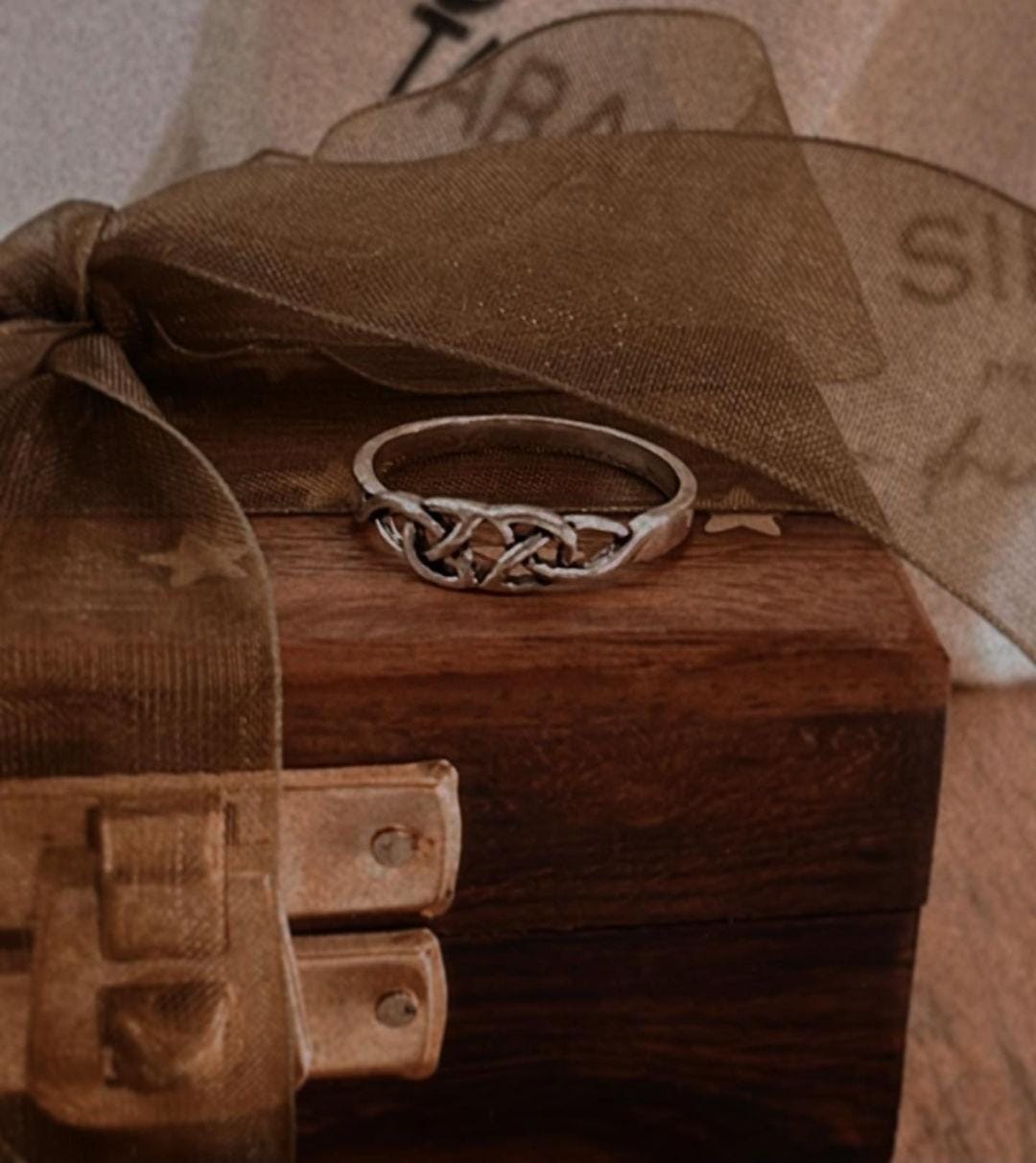 Elegant small Celtic knot ring in polished silver