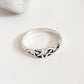 Minimalist Celtic knot ring in sterling silver