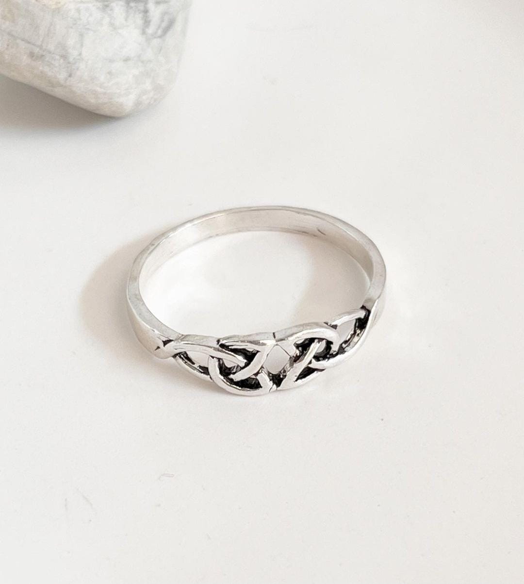 Minimalist Celtic knot ring in sterling silver