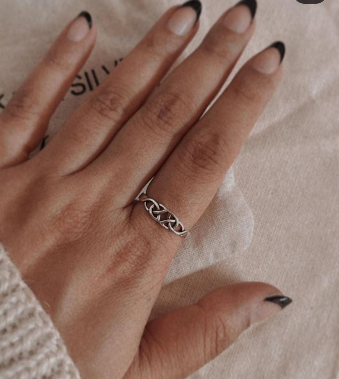 Timeless small silver ring with Celtic knot symbol