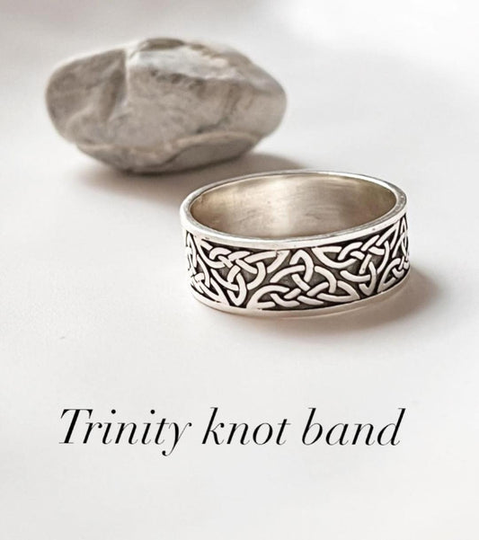 Thick Celtic knot band sterling silver ring