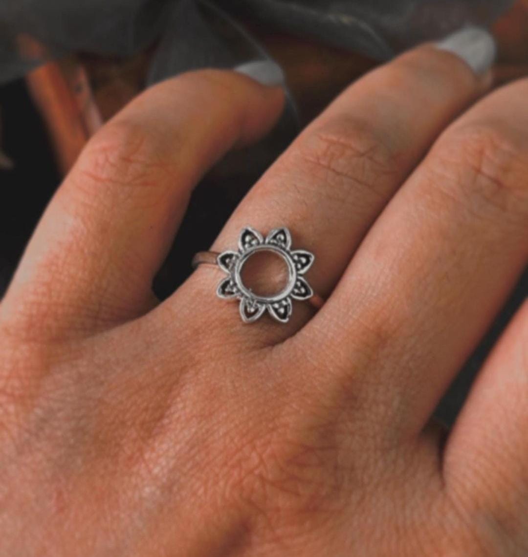 Handcrafted Soorajmukhi silver ring with floral design