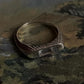 Handcrafted signet silver ring with a clear quartz gemstone centerpiece