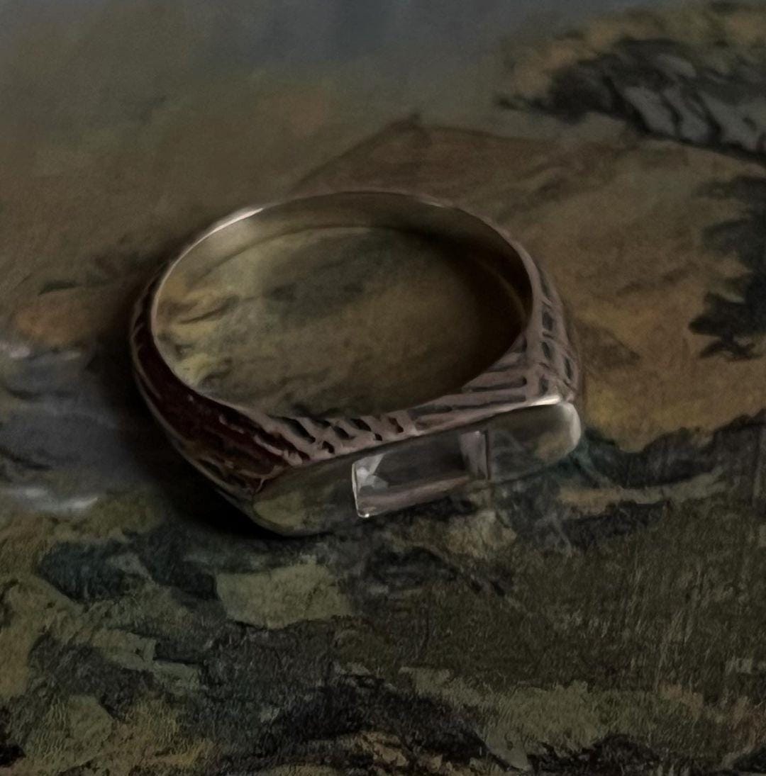 Handcrafted signet silver ring with a clear quartz gemstone centerpiece