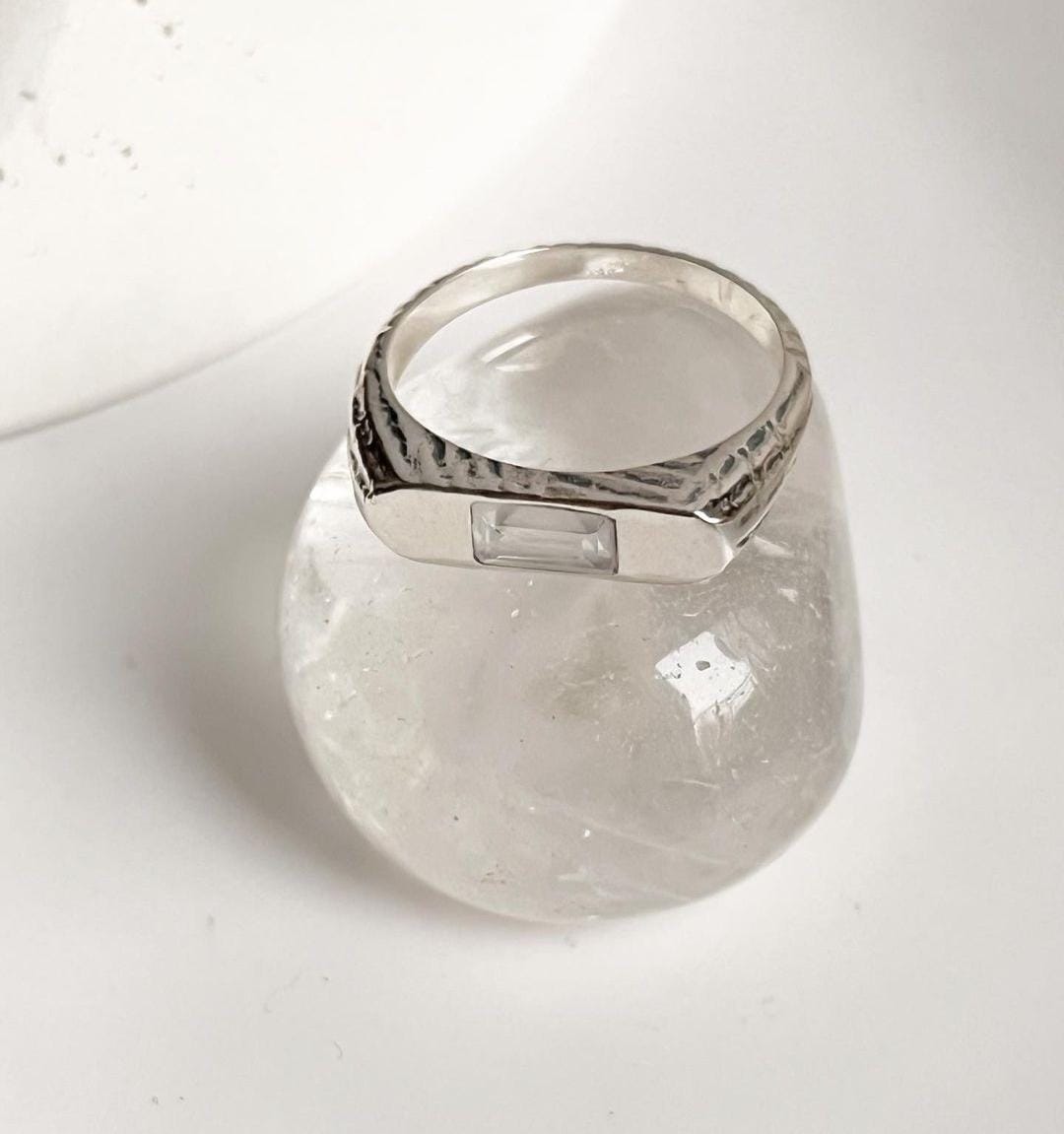 Timeless clear quartz signet ring with smooth silver band