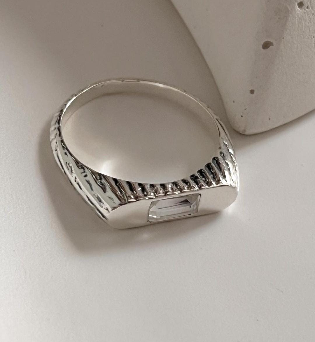 Clear quartz signet silver ring with sleek, polished design