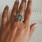 Handcrafted chunky silver ring showcasing a beautiful rose design