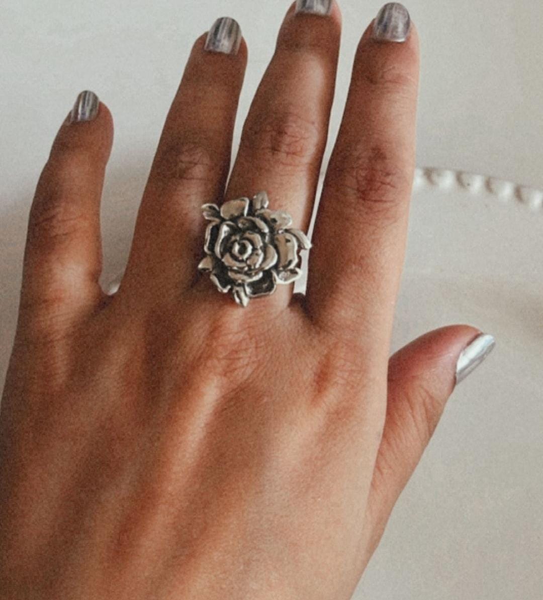 Handcrafted chunky silver ring showcasing a beautiful rose design