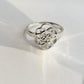Handcrafted silver ring with Seed of Life geometric pattern