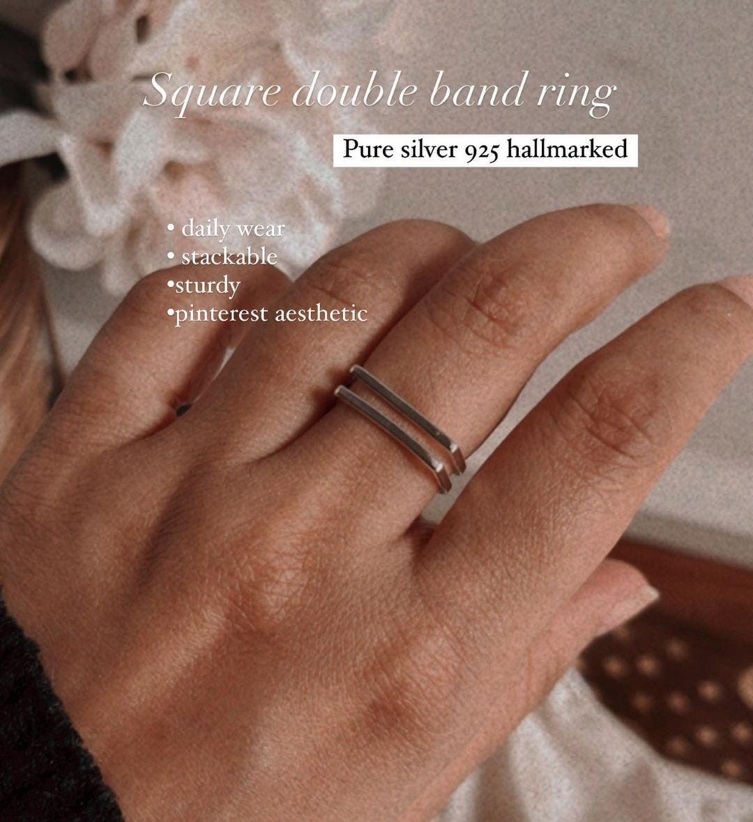Close-up of double square stackable silver ring with polished finish