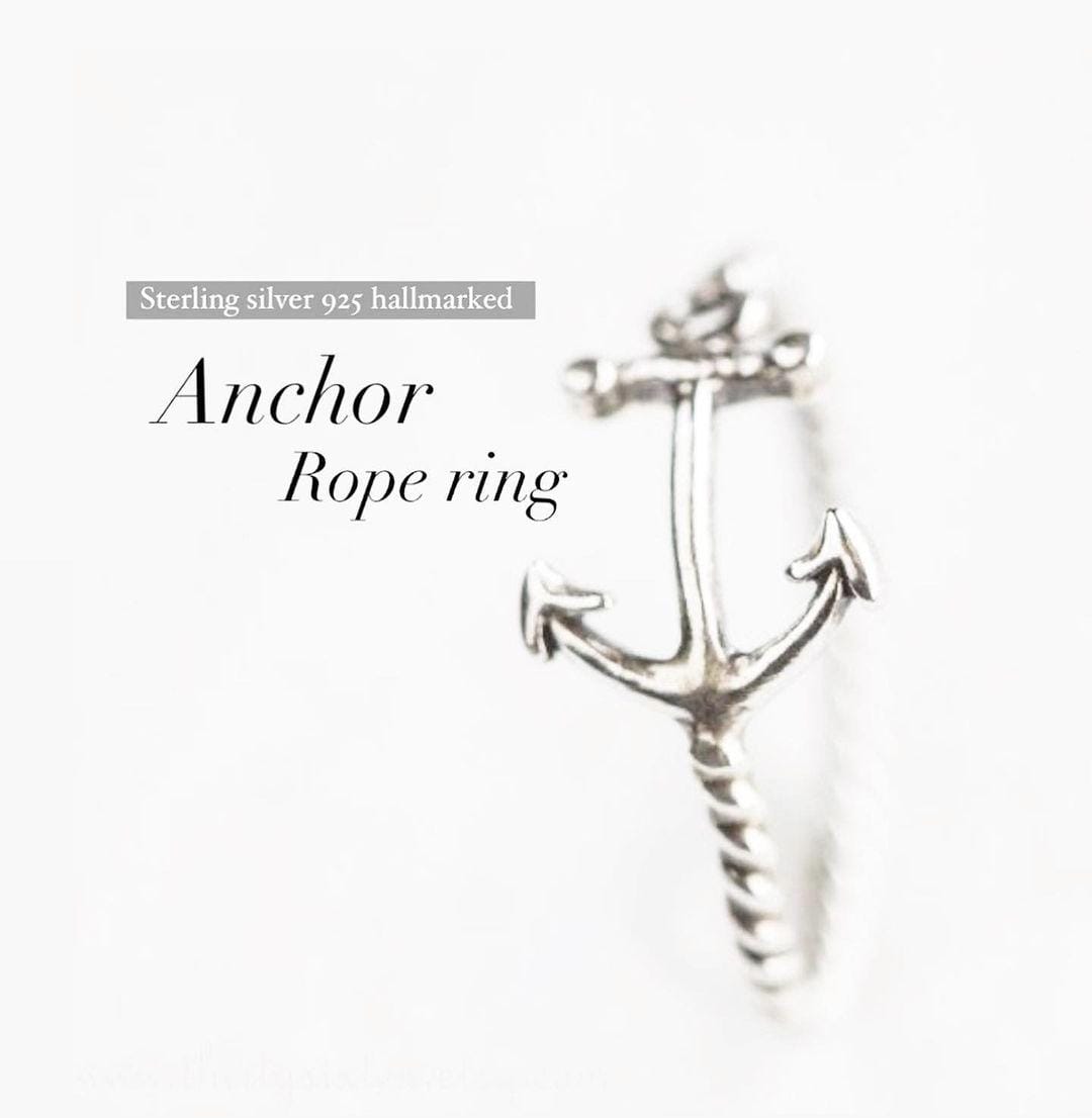 Sterling silver ring featuring a nautical anchor design.