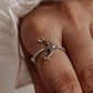 Elegant silver ring with a bold anchor symbol.