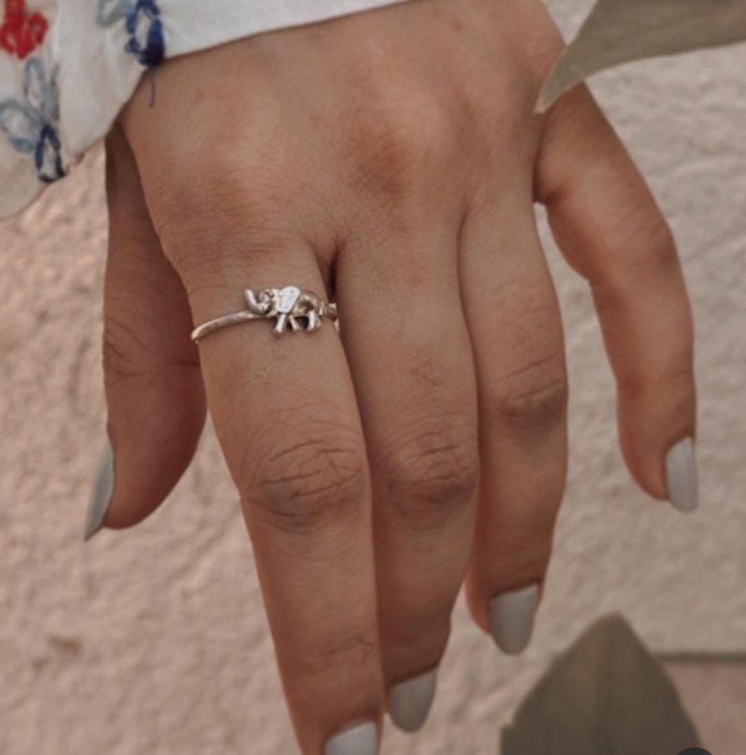 Handcrafted elephant silver ring with unique and playful design