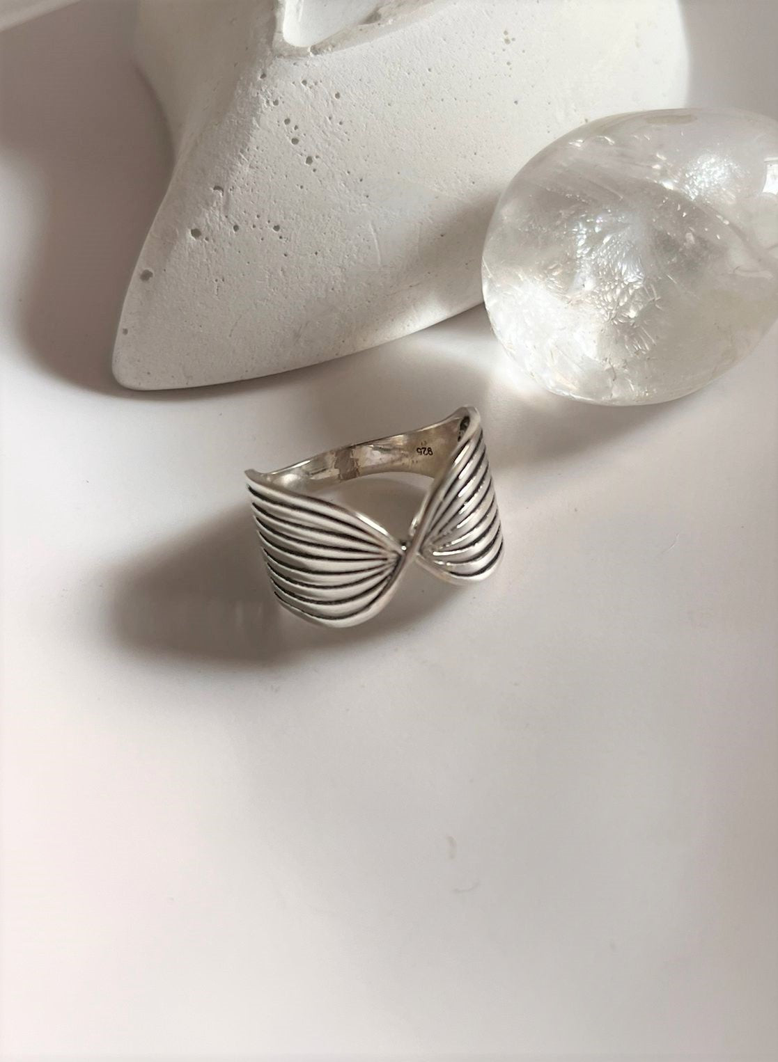 Minimalist Beli silver ring for a sleek and modern look.