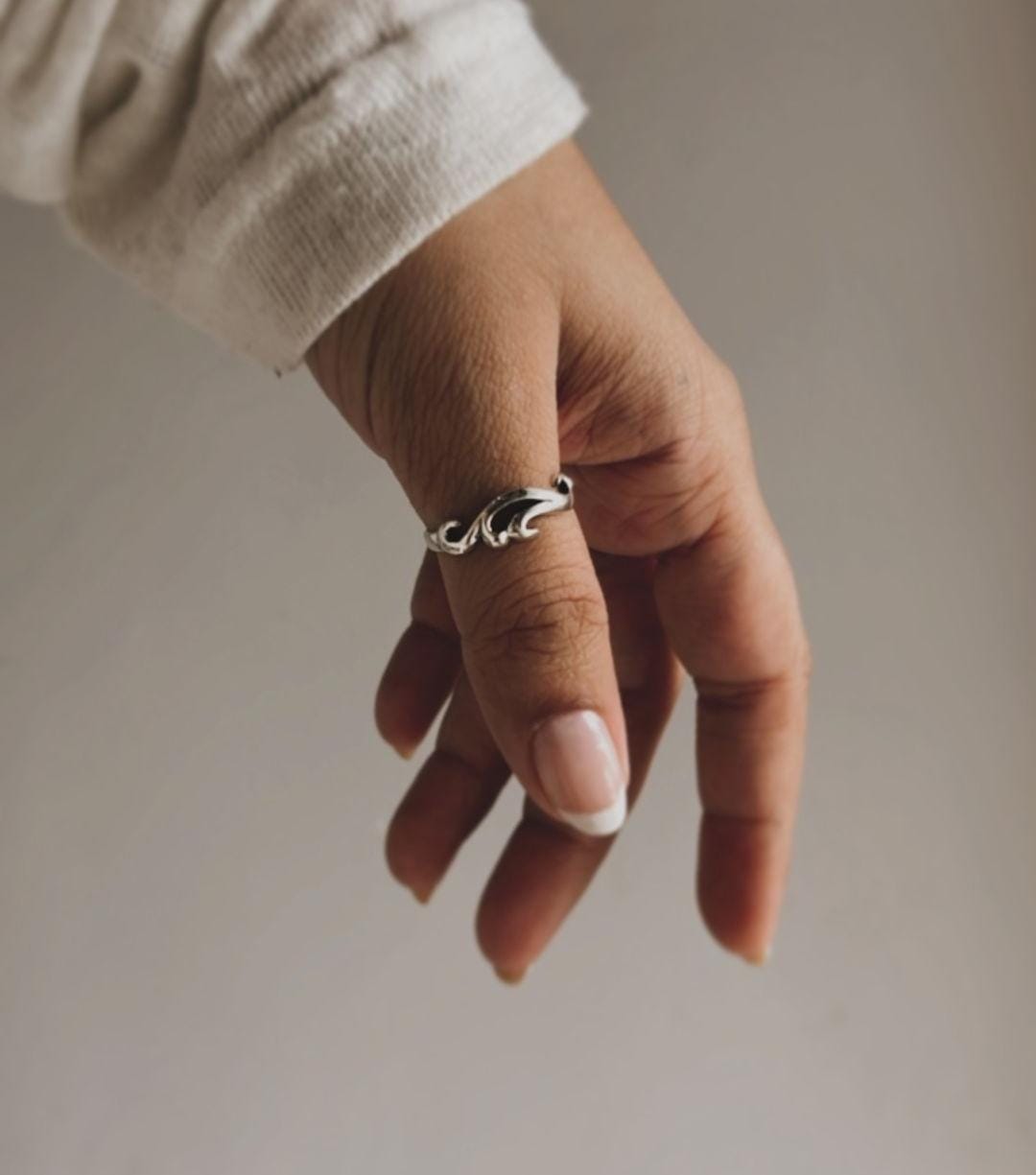 Wave-inspired sterling silver ring for unique style