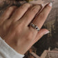 Elegant silver ring with wave motif design