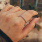 Polished silver rope band ring designed for stackable looks