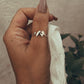 Elegant elephant-themed adjustable silver ring with polished finish