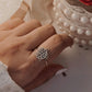 Charming tortoise silver ring with filigree detail