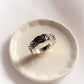 Chunky braided silver ring with a modern and bold look