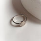 Delicate shell-shaped silver ring for a coastal look