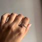 Timeless silver ring with a detailed anchor motif.
