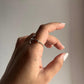 Sophisticated silver ring with an anchor symbol for a nautical touch.