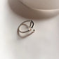 Sleek sterling silver ring featuring a minimalist anchor design.