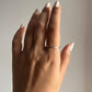 Charming stackable silver 925 ring with delicate dot band accents