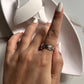 Unique floral spinner silver ring perfect for adding movement to your style